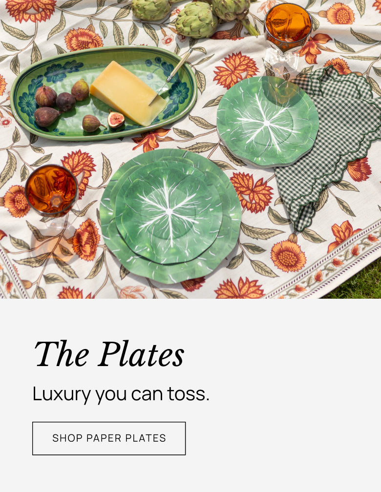 Green paper plates on a floral tablecloth with text overlay.