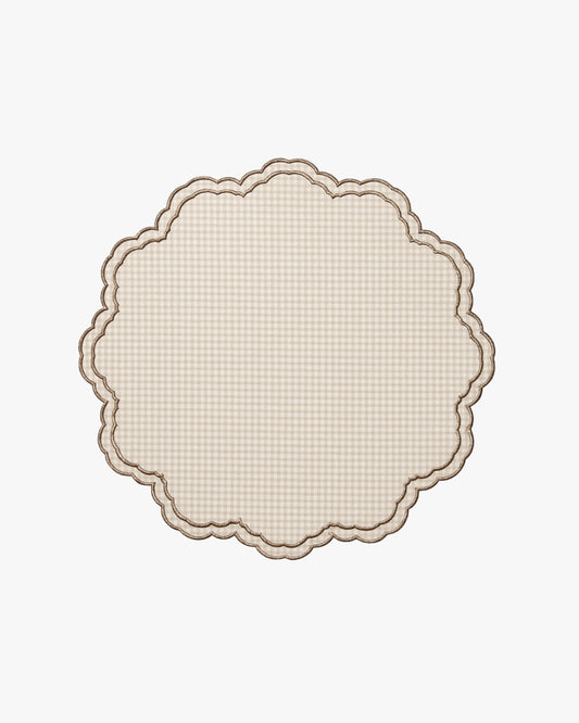 Round decorative border with scalloped edge on a beige background