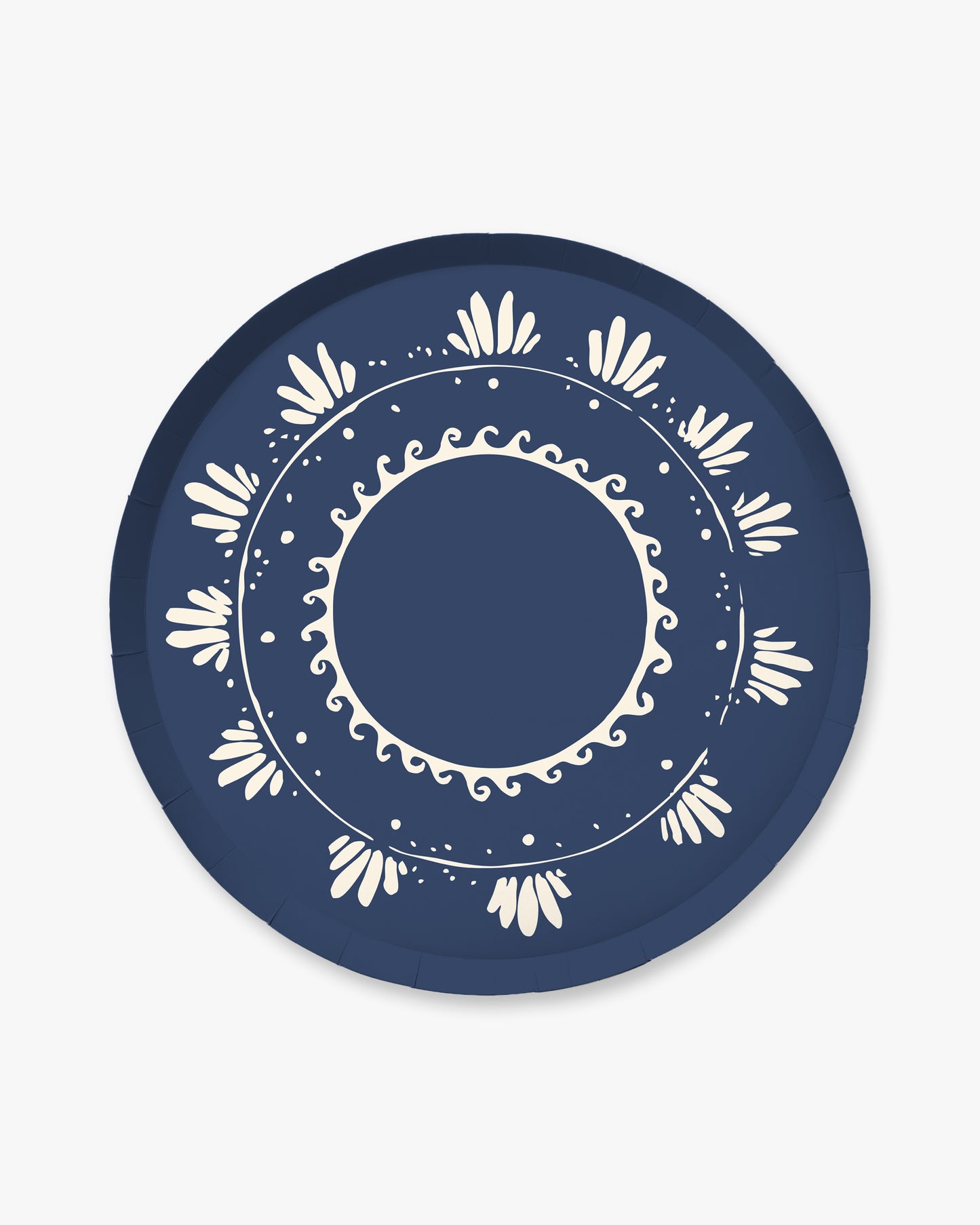 Navy blue plate with white decorative pattern on a light gray background