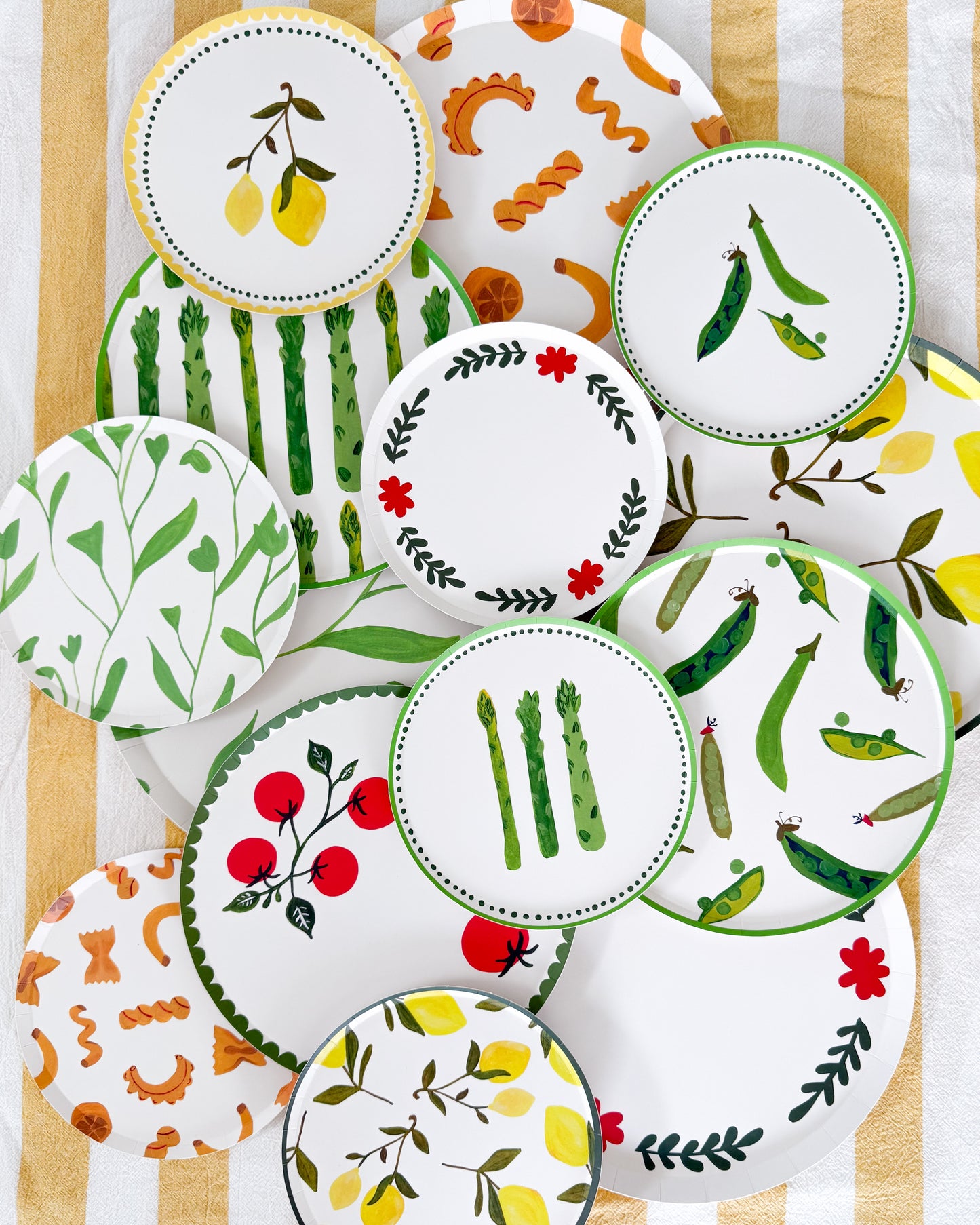 plates scattered on a surface with different colorful patterns