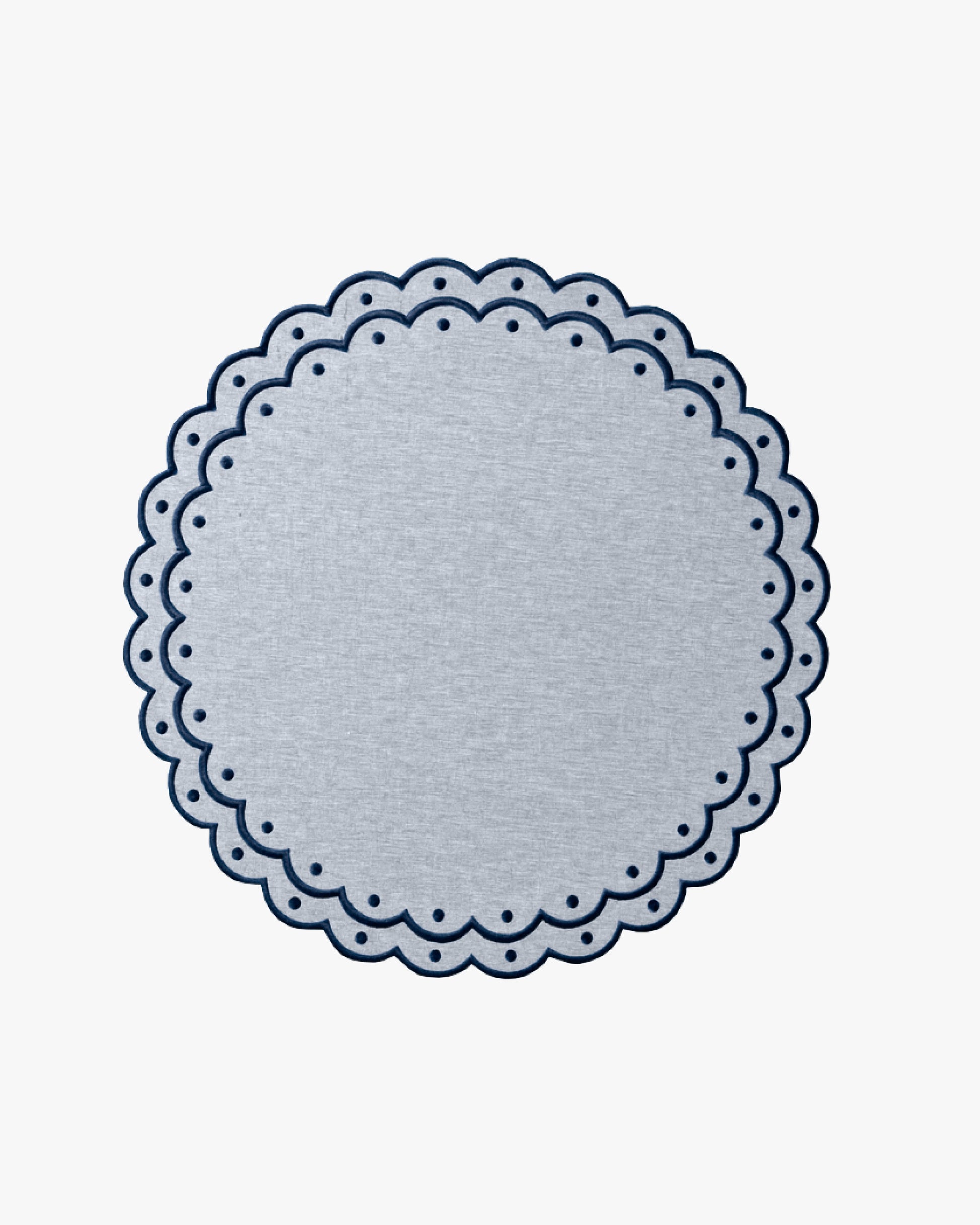 Blue placemat with dark blue embroidery