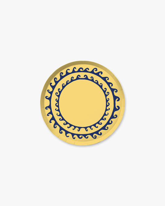 A navy blue wave design on a yellow background