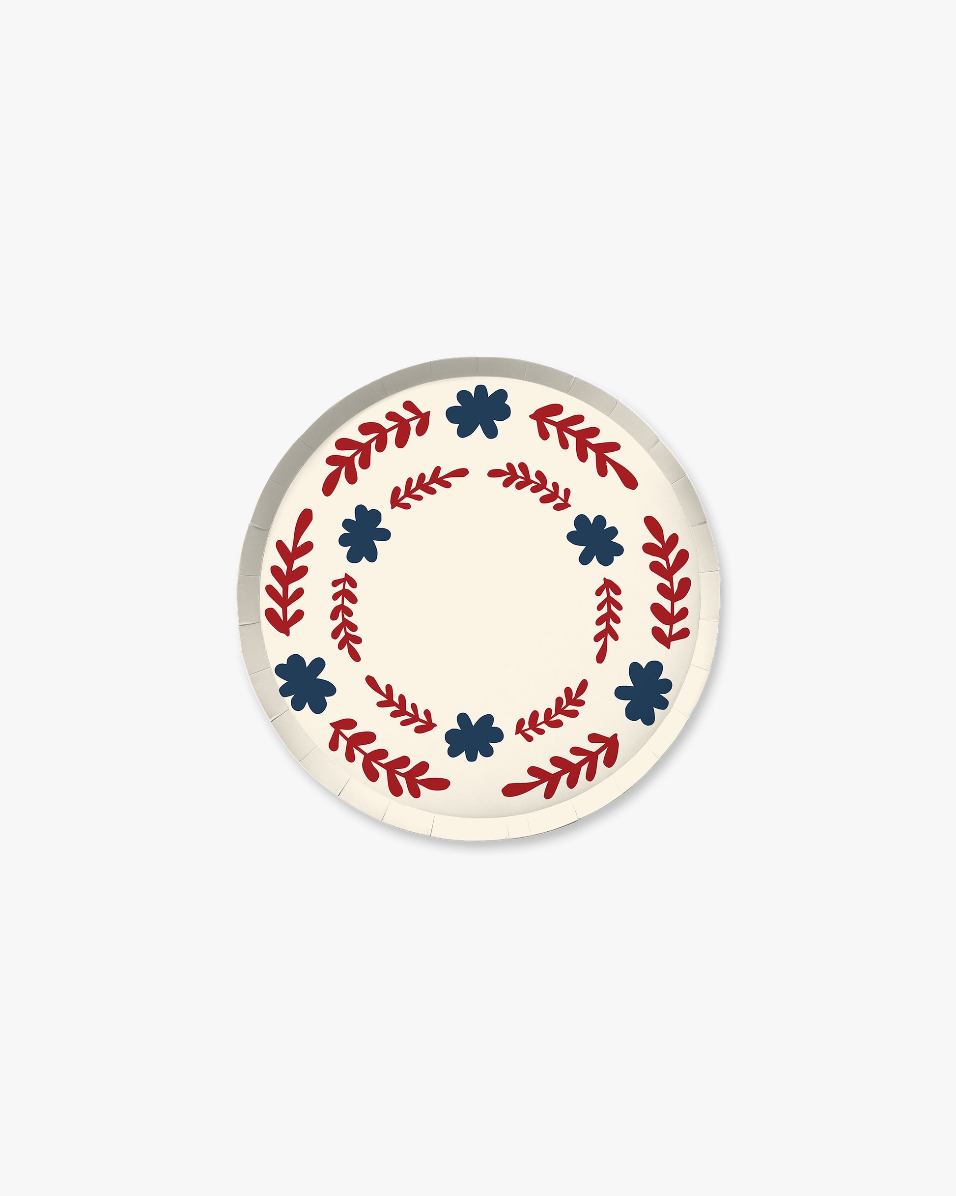 Round  plate with decorative red and blue patterns on a white background