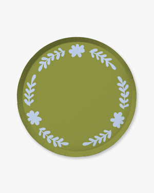 Green paper plate with light blue floral and leaf patterns
