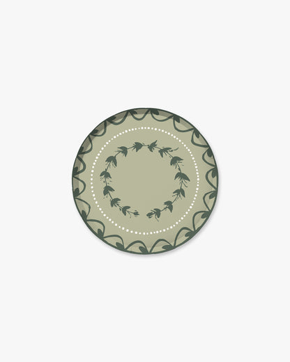 A decorative green and light green plate