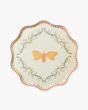 Decorative plate with a butterfly design on a white background