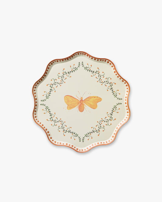 Decorative plate with a butterfly design on a white background