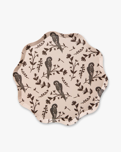 Decorative plate with a bird and leaf pattern 