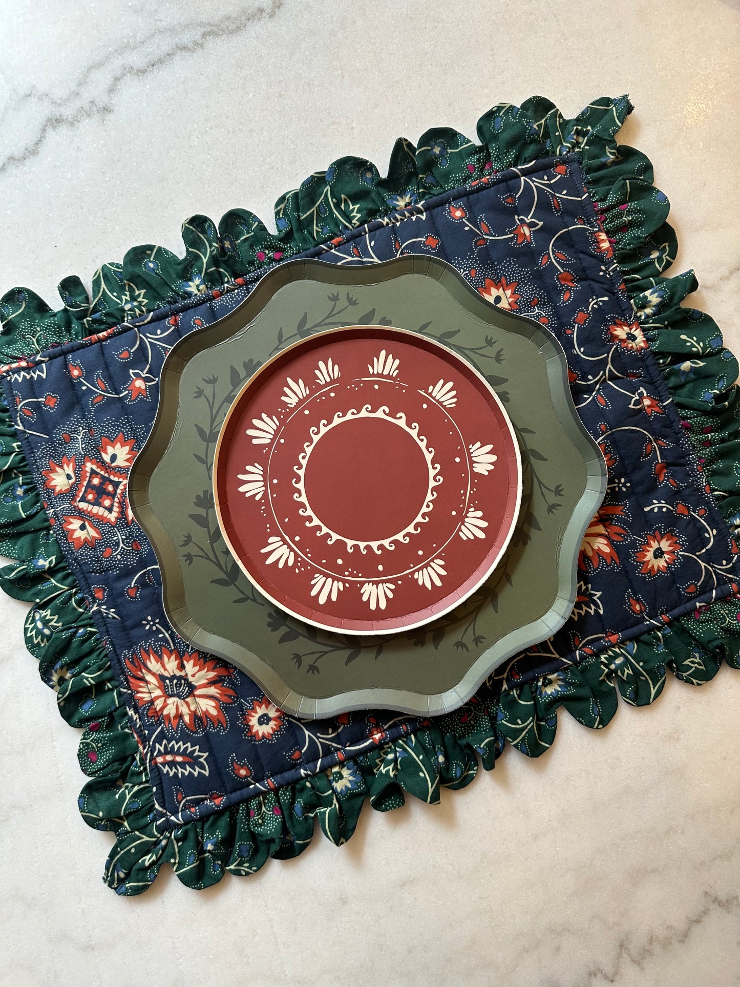 Decorative plate with intricate design on a placemat