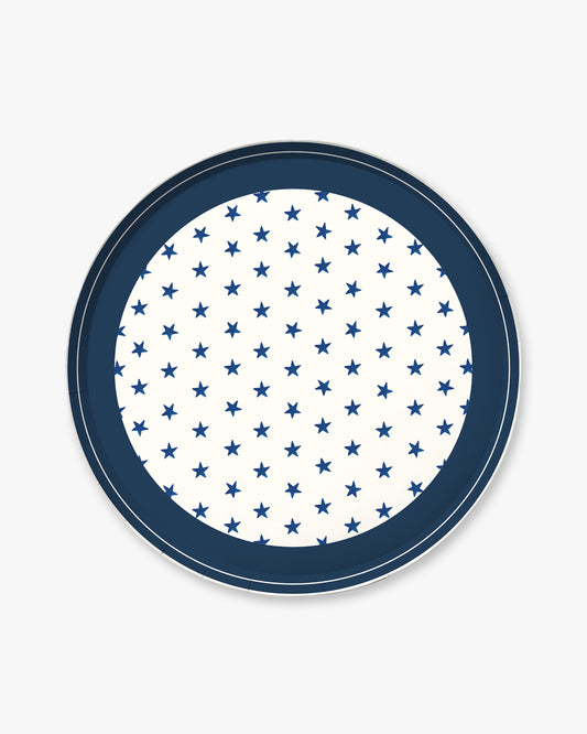 Round plate with blue star pattern on a white background