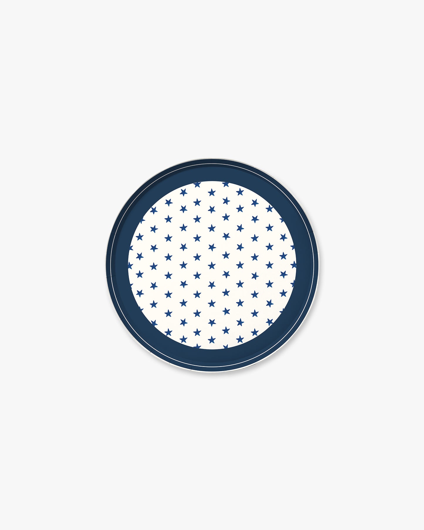 Round blue plate with white star pattern on a white background