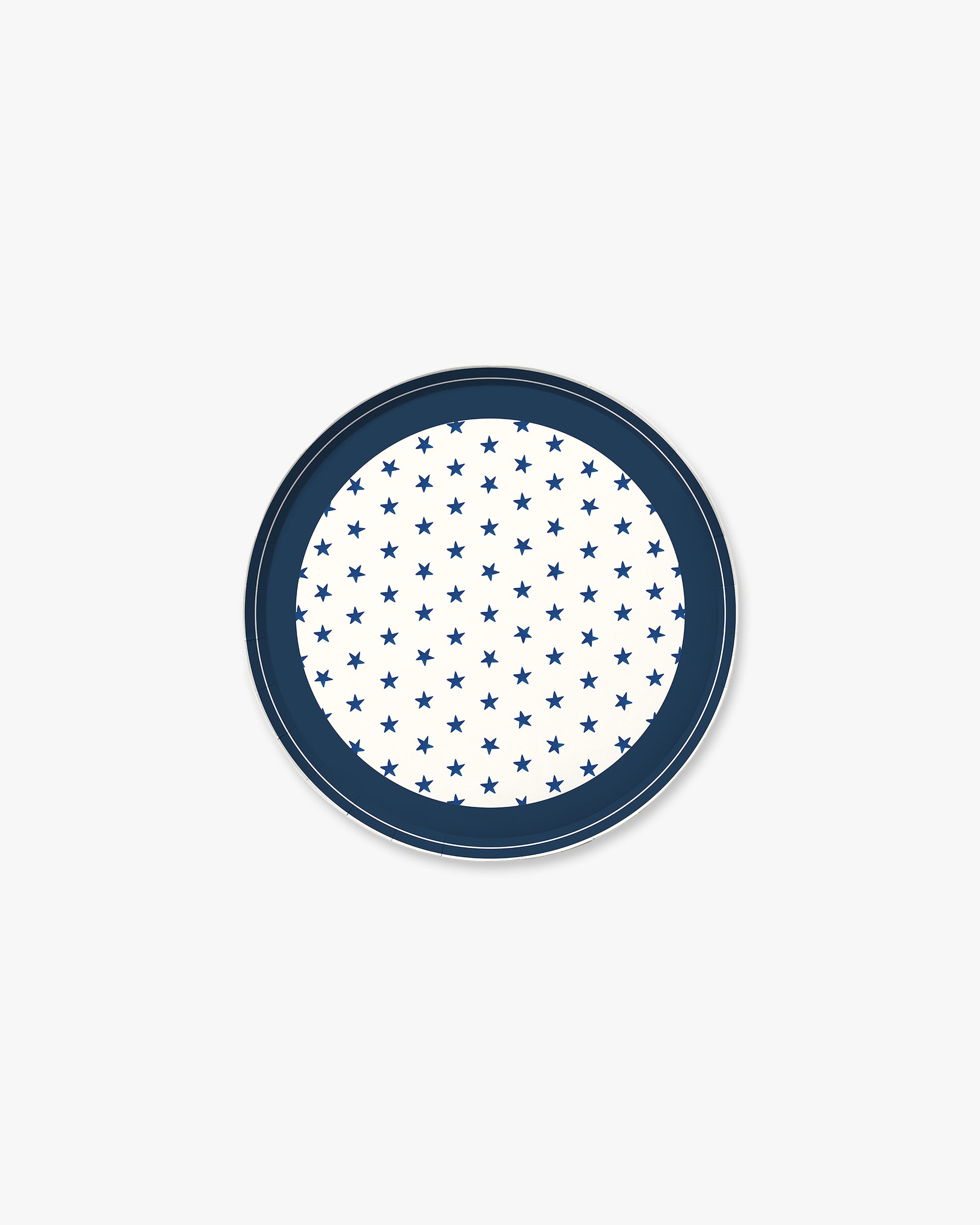 Round blue plate with white star pattern on a white background