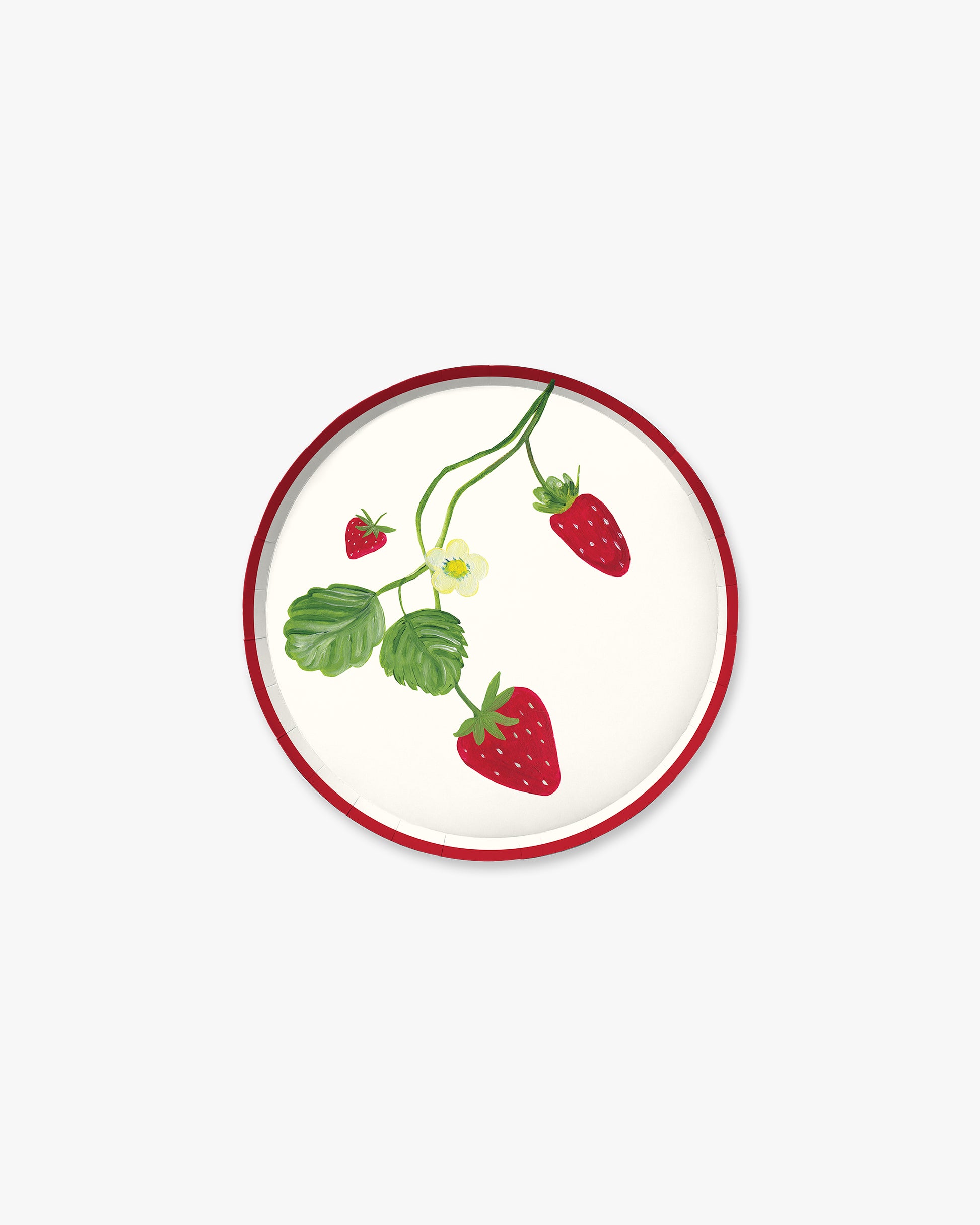 round white plate with strawberry design on a white background