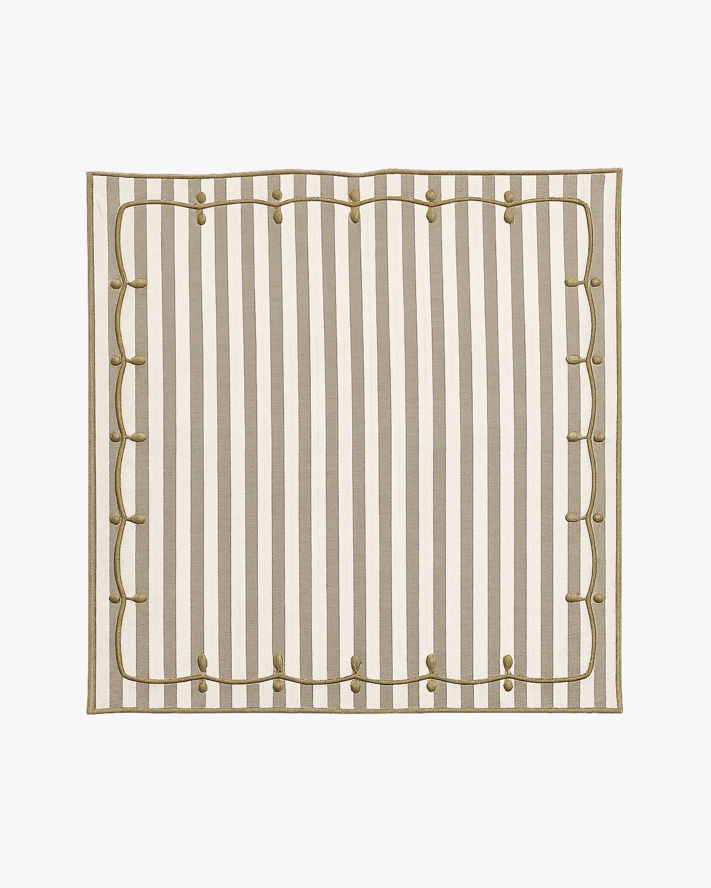 green and white striped napkin with embroidery detail