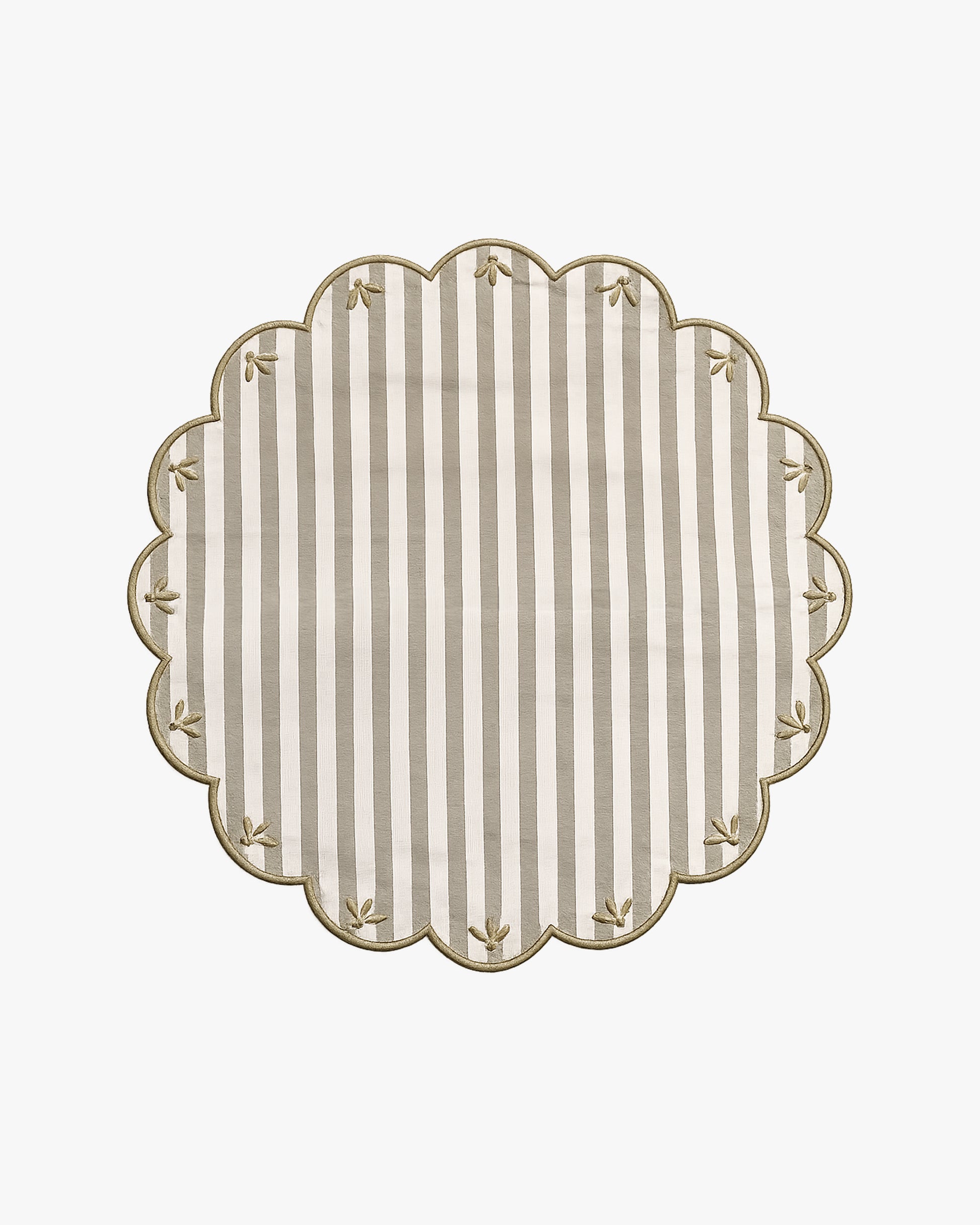 a green and white striped placemat with embroidery