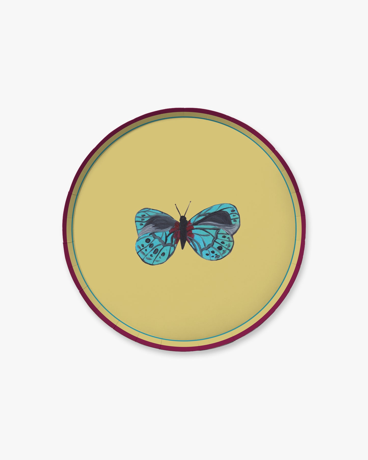 A turquoise butterfly on a chartreuse green background