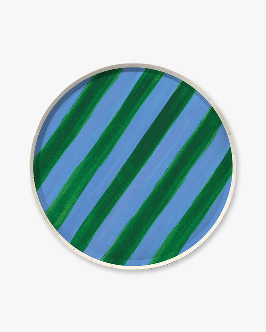 Round ceramic plate with blue and green striped pattern on a white background