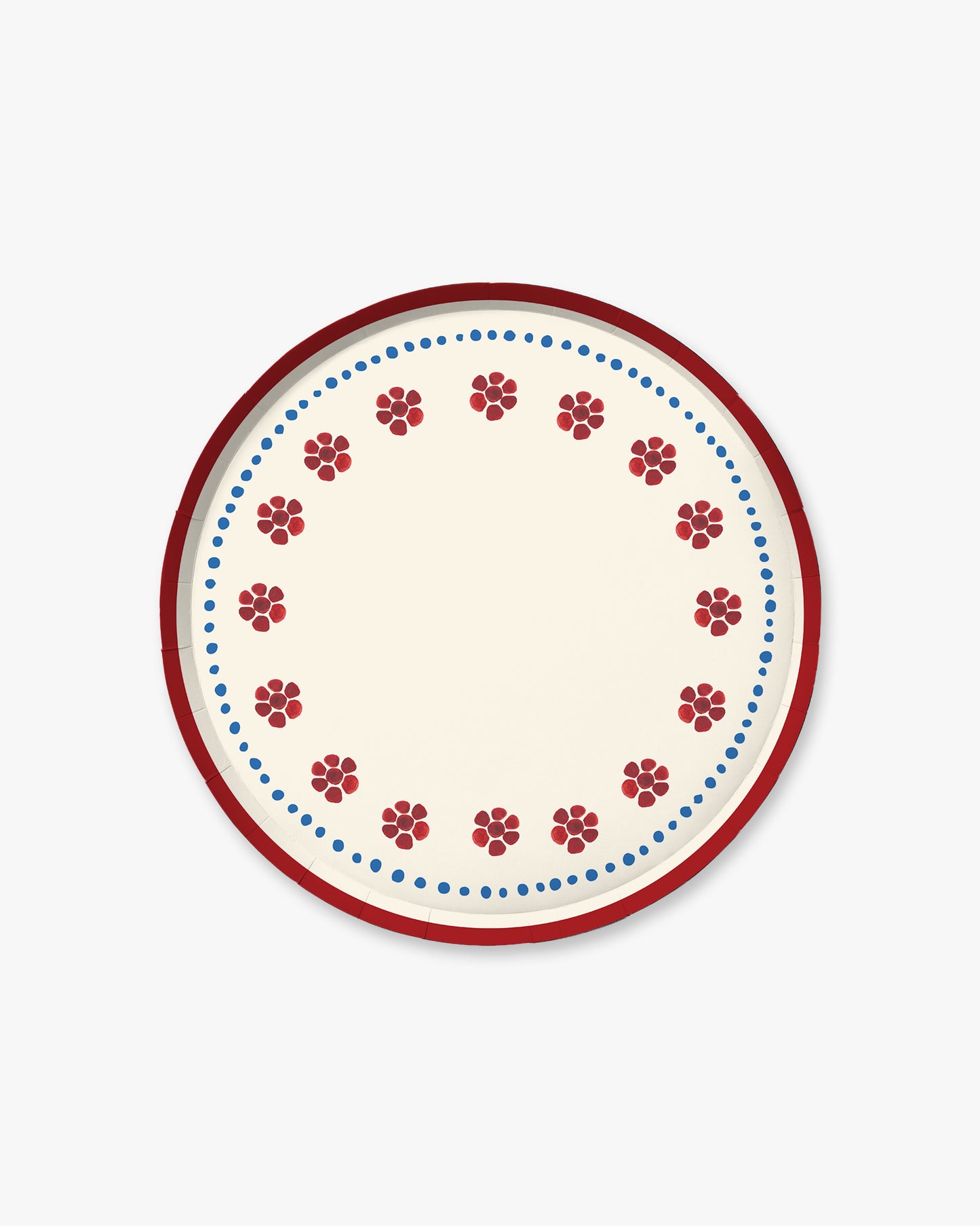 a red white and blue plate with floral details