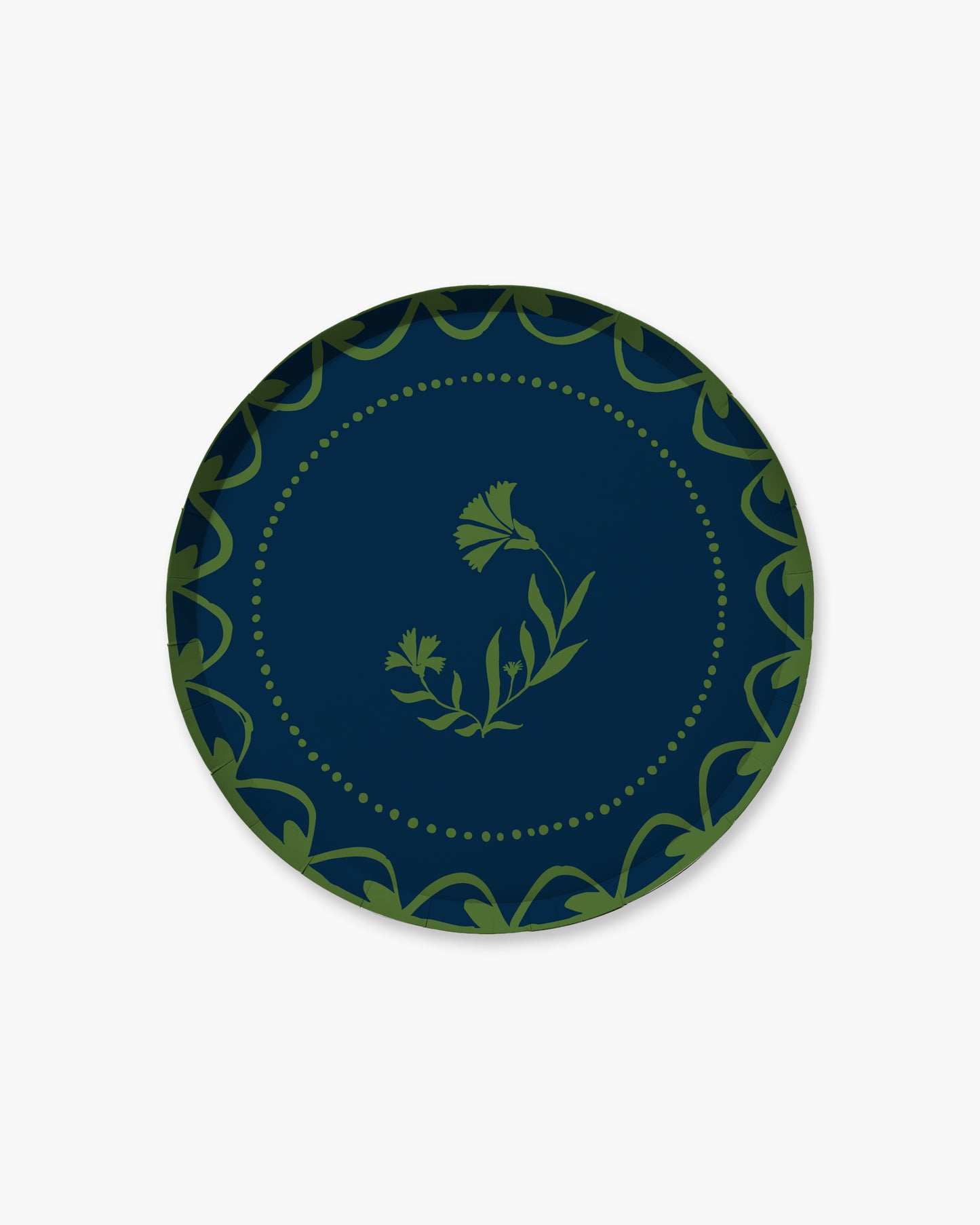 Navy blue plate with green decorative border and floral design 