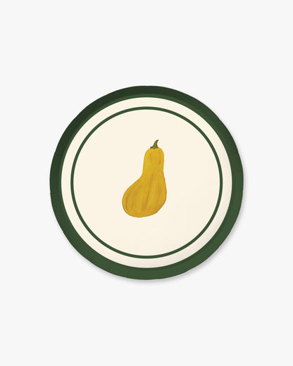 A round decorative plate featuring a yellow squash illustration in the center, surrounded by a cream background and a dark green border, shown on a light gray background.