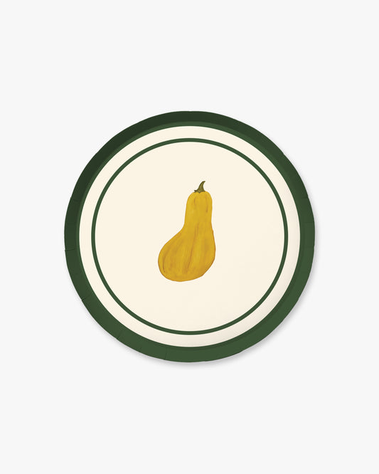 A round decorative plate featuring a yellow squash illustration in the center, surrounded by a cream background and a dark green border, shown on a light gray background.