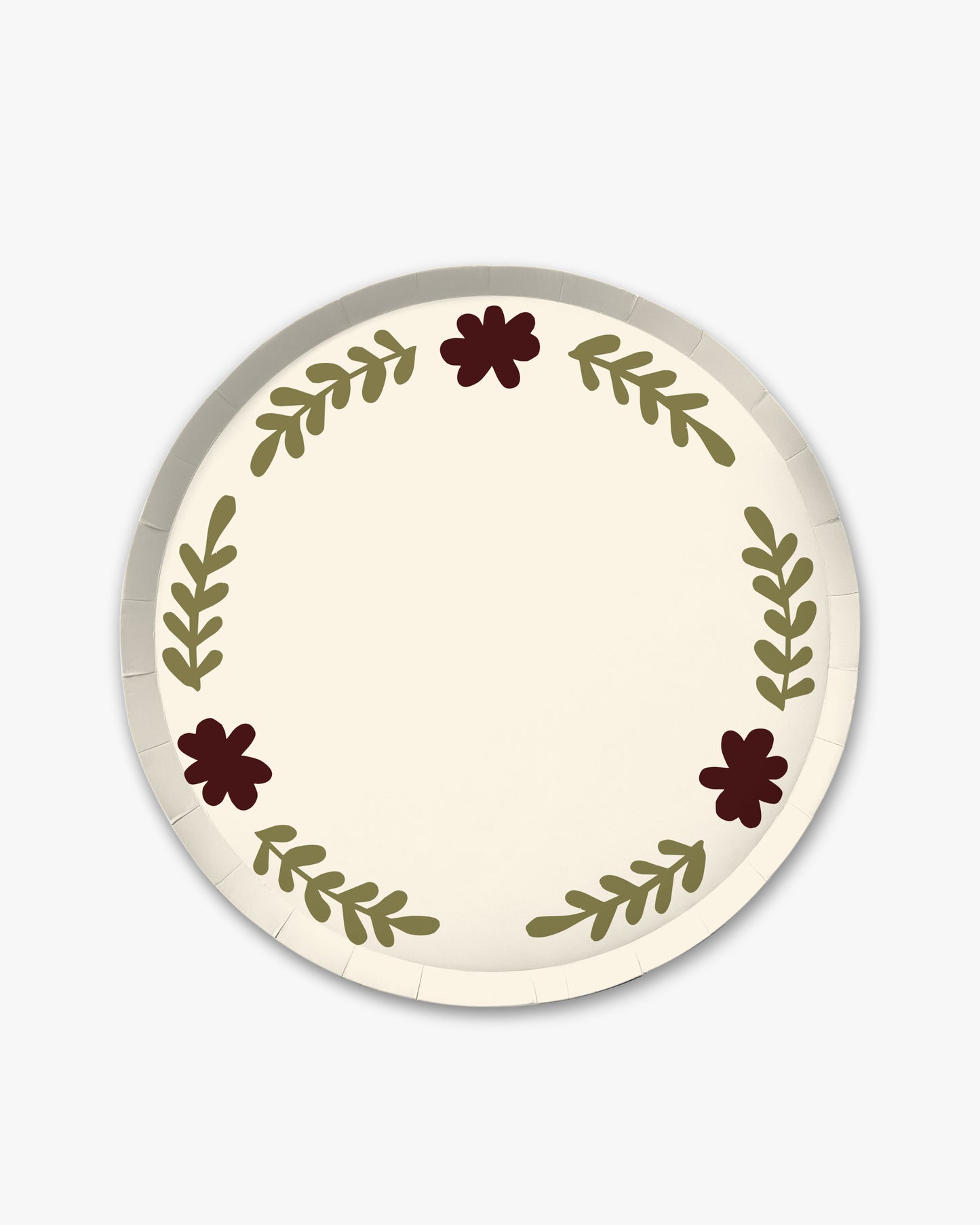 a cream decorative plate with brown and green floral designs