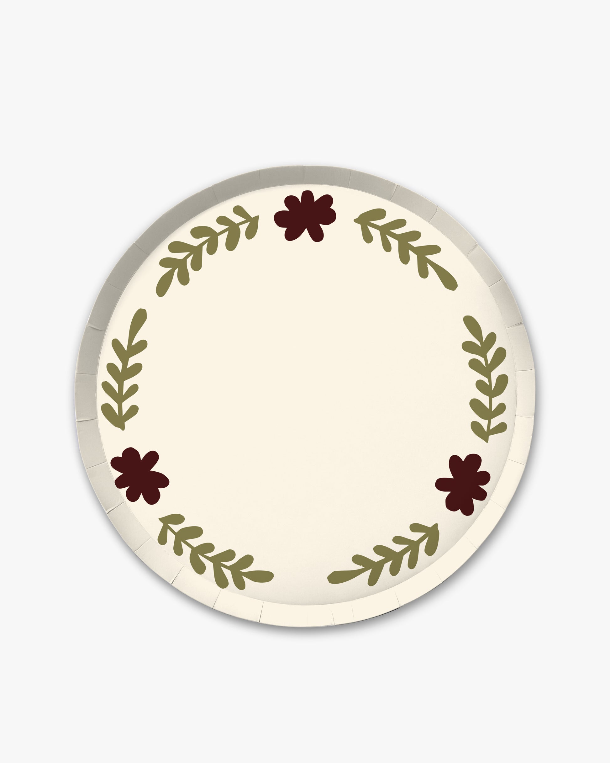 a cream decorative plate with brown and green floral designs