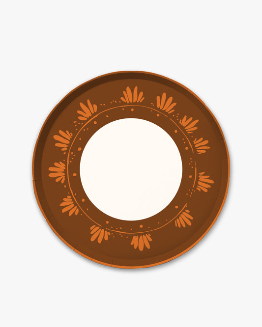10.5-inch round decorative paper plate in rich cider brown with an orange floral border and a white center.