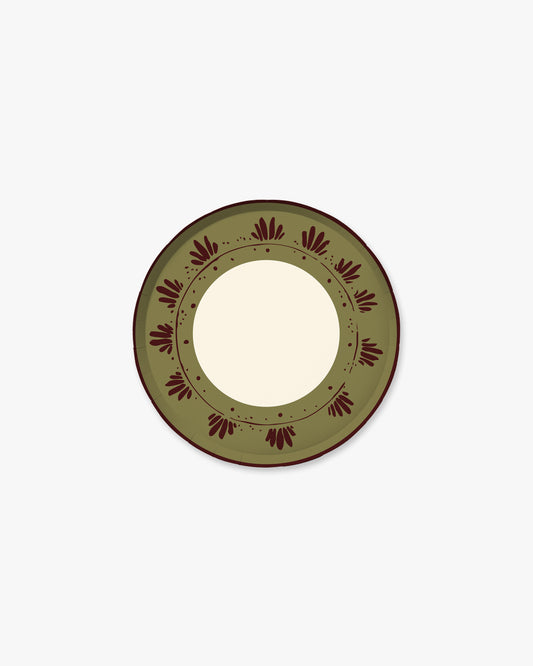 A round decorative plate with a wide olive green border featuring a dark reddish-brown floral pattern and a cream-colored reflective center, shown against a plain white background.