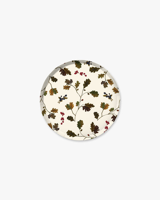 A round decorative plate featuring a vintage botanical pattern of oak leaves and small berries on an off-white background, shown against a plain light gray backdrop.