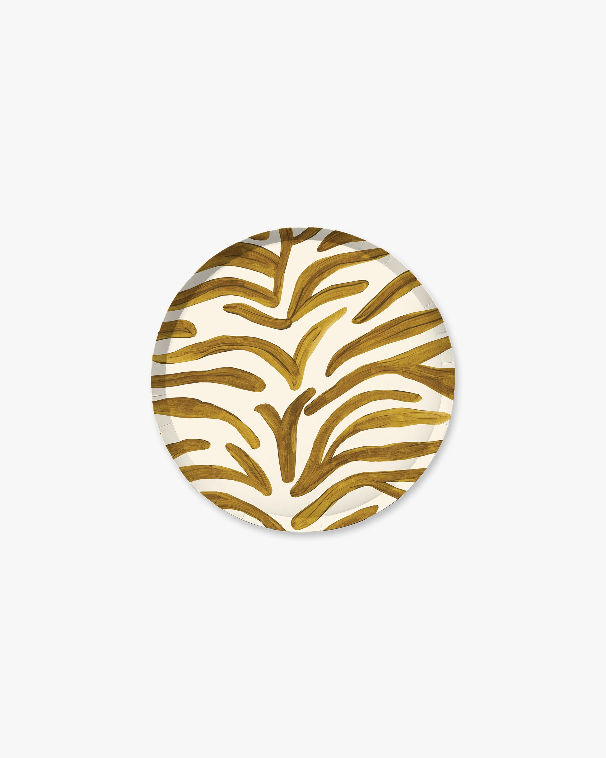 A round paper plate featuring a gold zebra-stripe pattern on a white background, centered on a light gray studio backdrop.