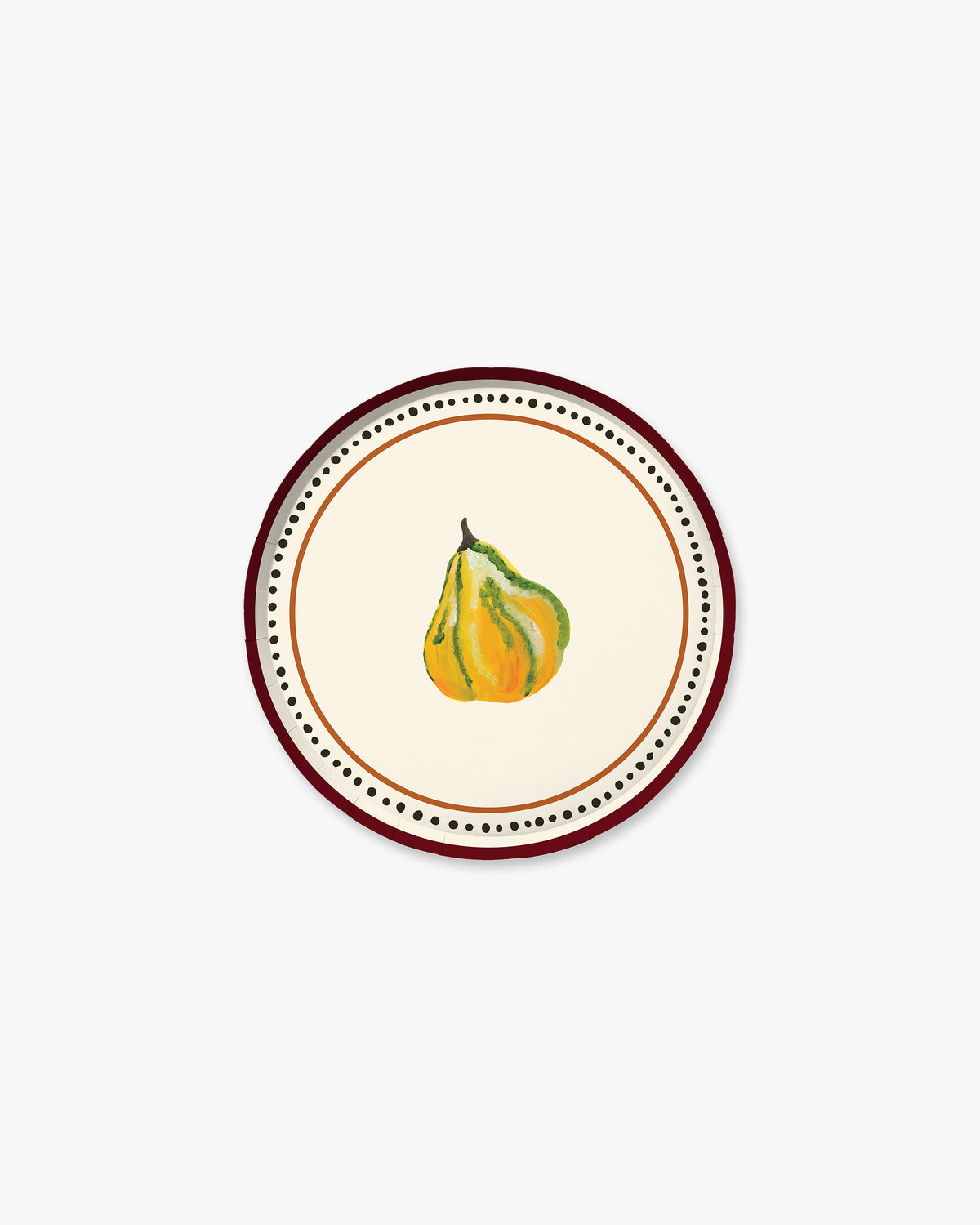 A round decorative plate featuring a central illustration of a small yellow and green gourd with a brown stem, surrounded by concentric rings of black dots and a dark brown outer border on a light cream background.