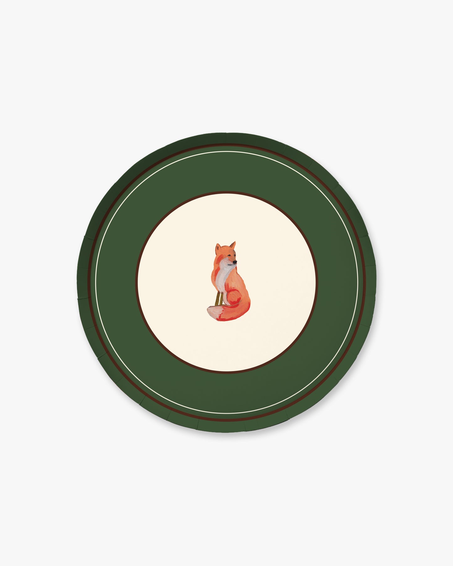 A round decorative plate featuring a dark green outer border with thin gold and brown concentric lines, a cream center, and a small illustrated fox sitting in the middle.