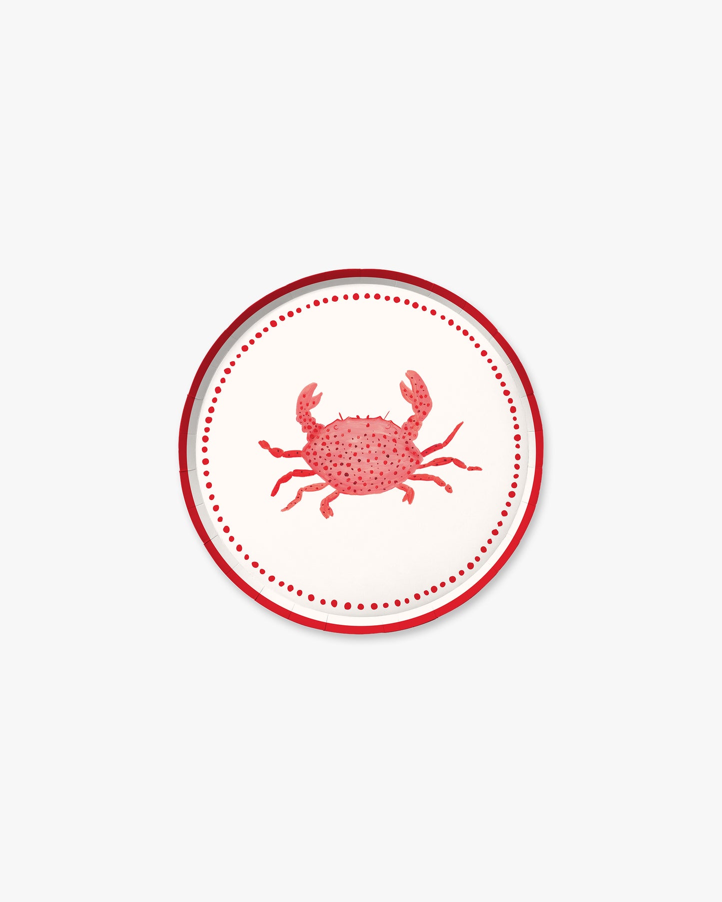 A white plate with a red crab in the center