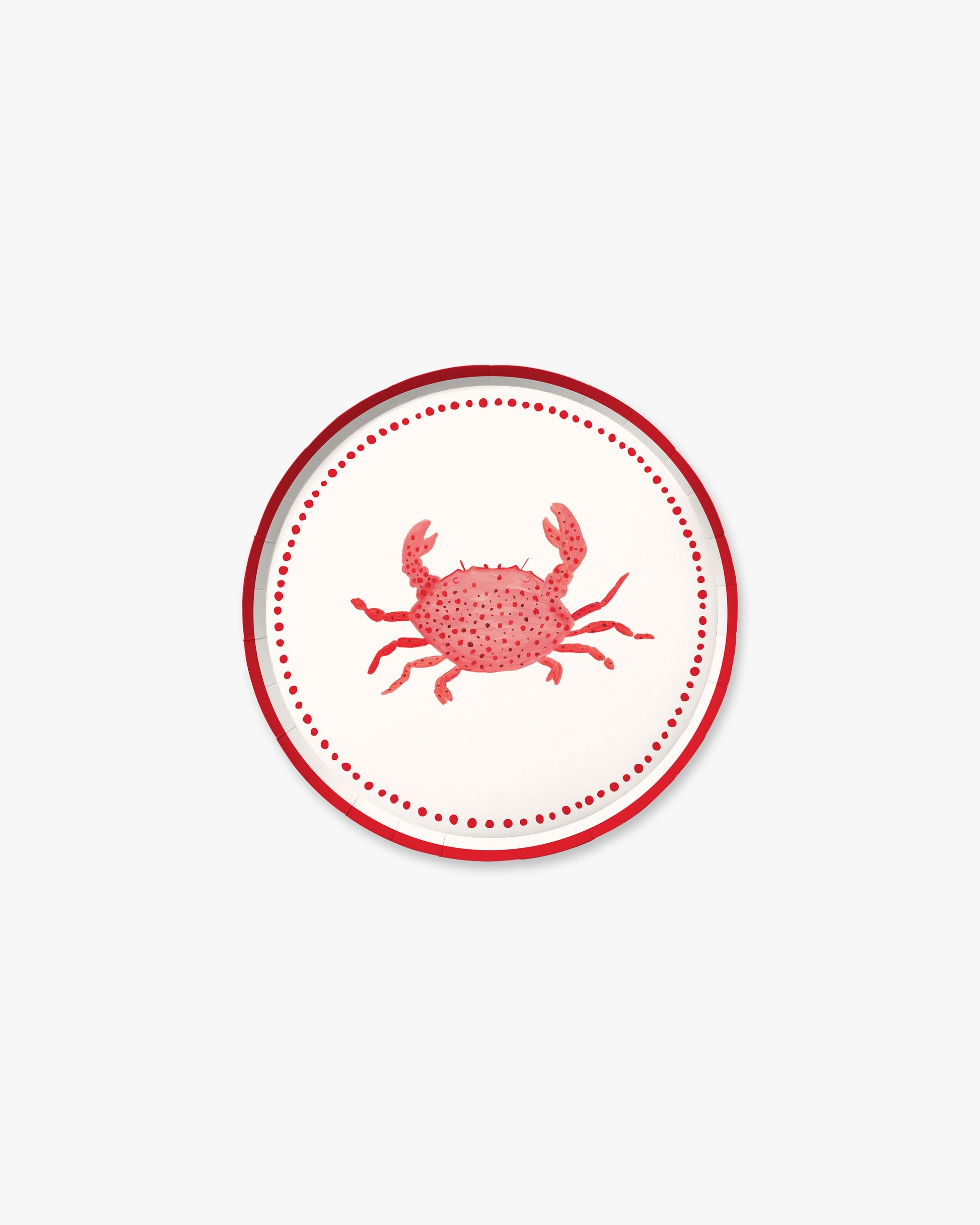 A white plate with a red crab in the center