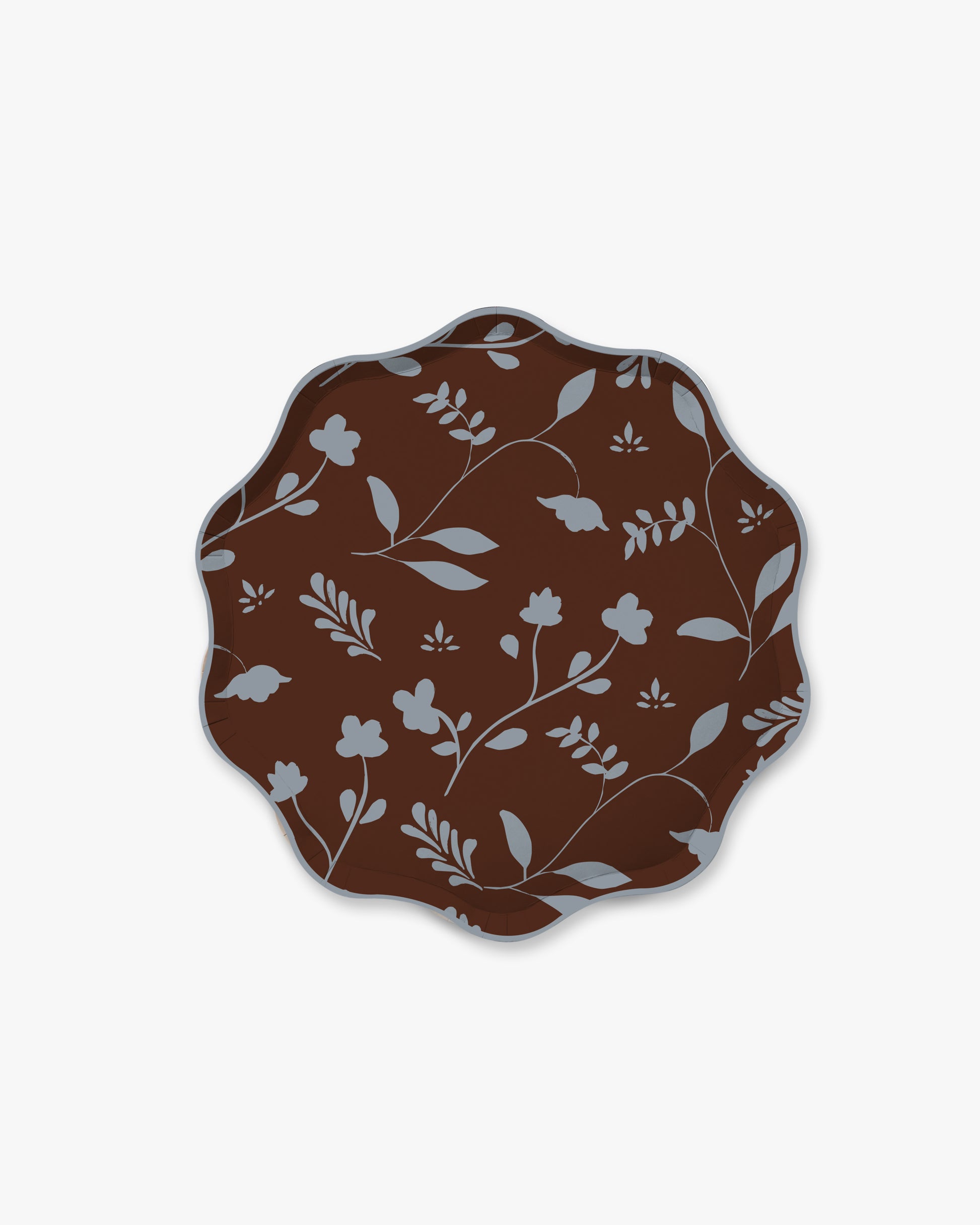 A scalloped oval plate featuring a dark brown background with a light gray floral and leaf pattern, shown against a plain light gray background.