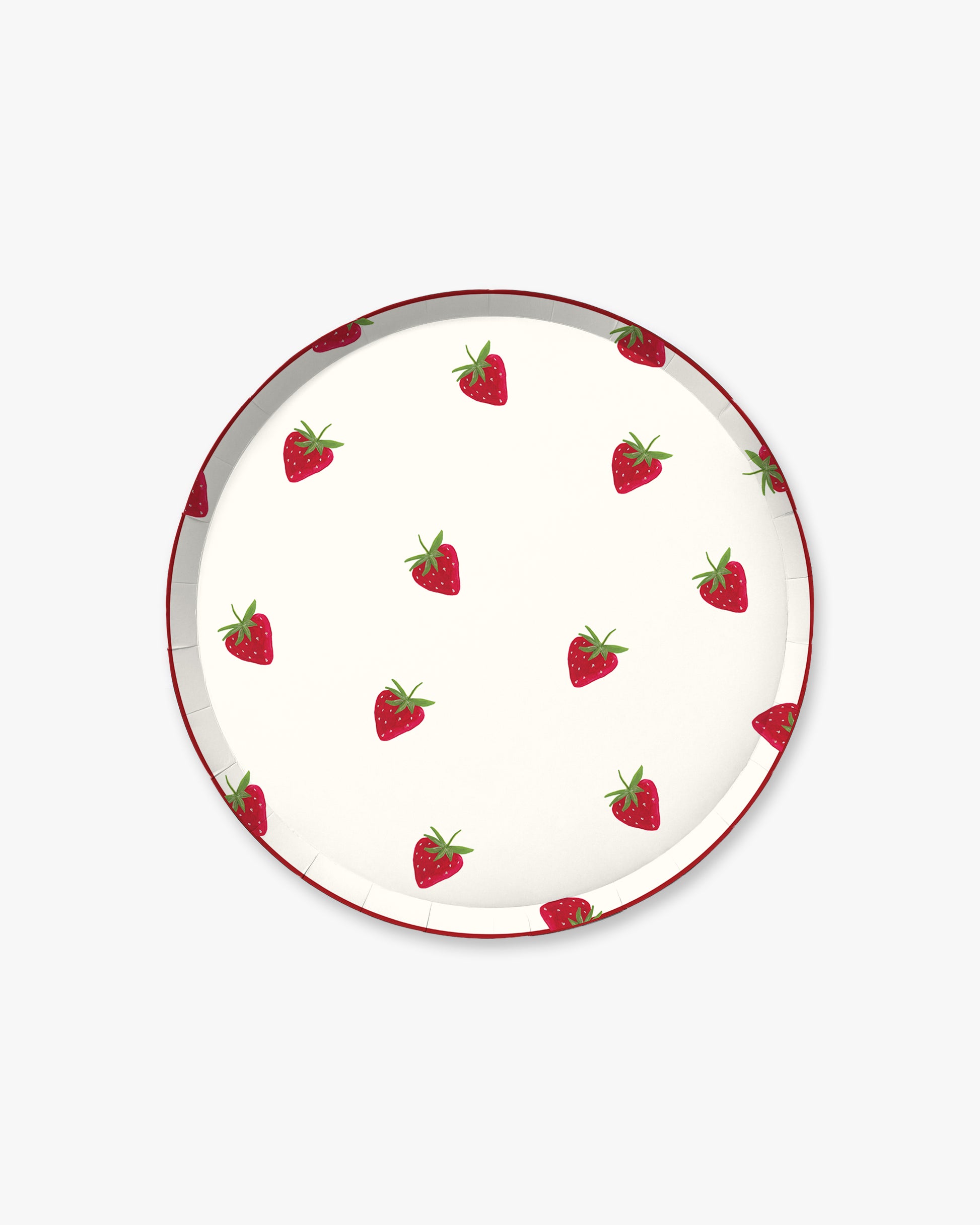 Round plate with strawberry pattern on a white background