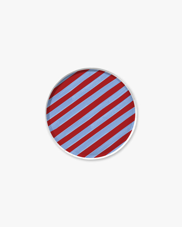round plate with red and blue diagonal stripes on a white background