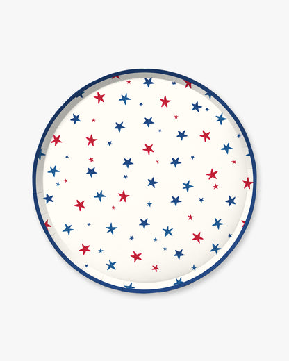Round plate with red and blue star pattern on a white background