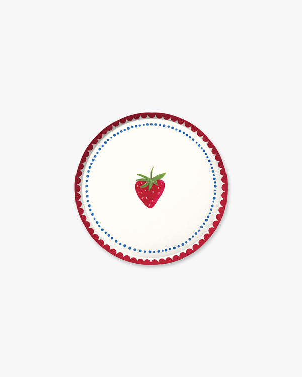 Round plate with a strawberry design on a white background