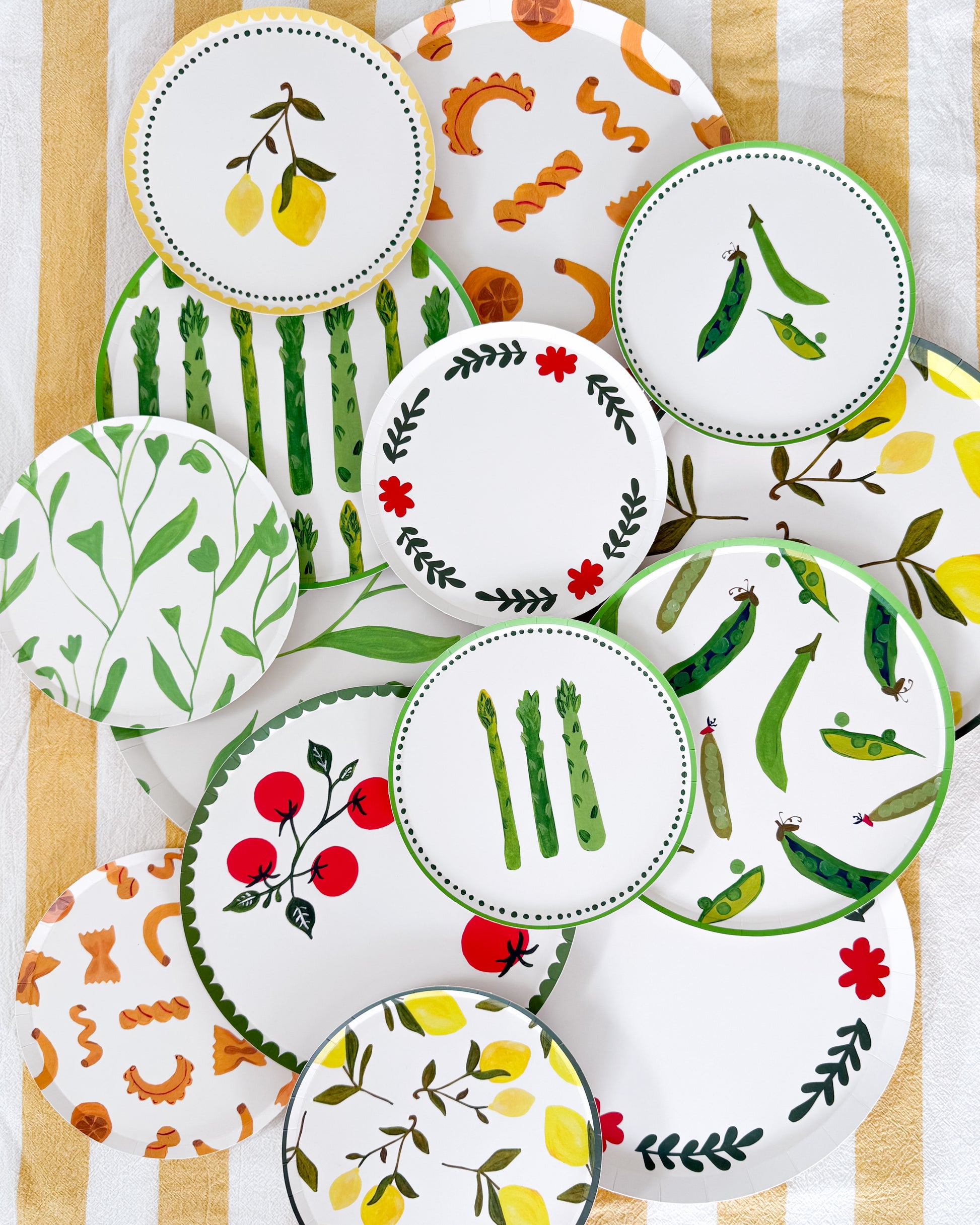 plates scattered on a surface with different colorful patterns
