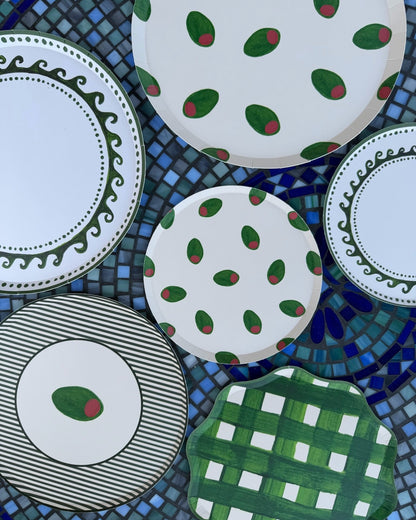 decorative plates displayed on a tile table