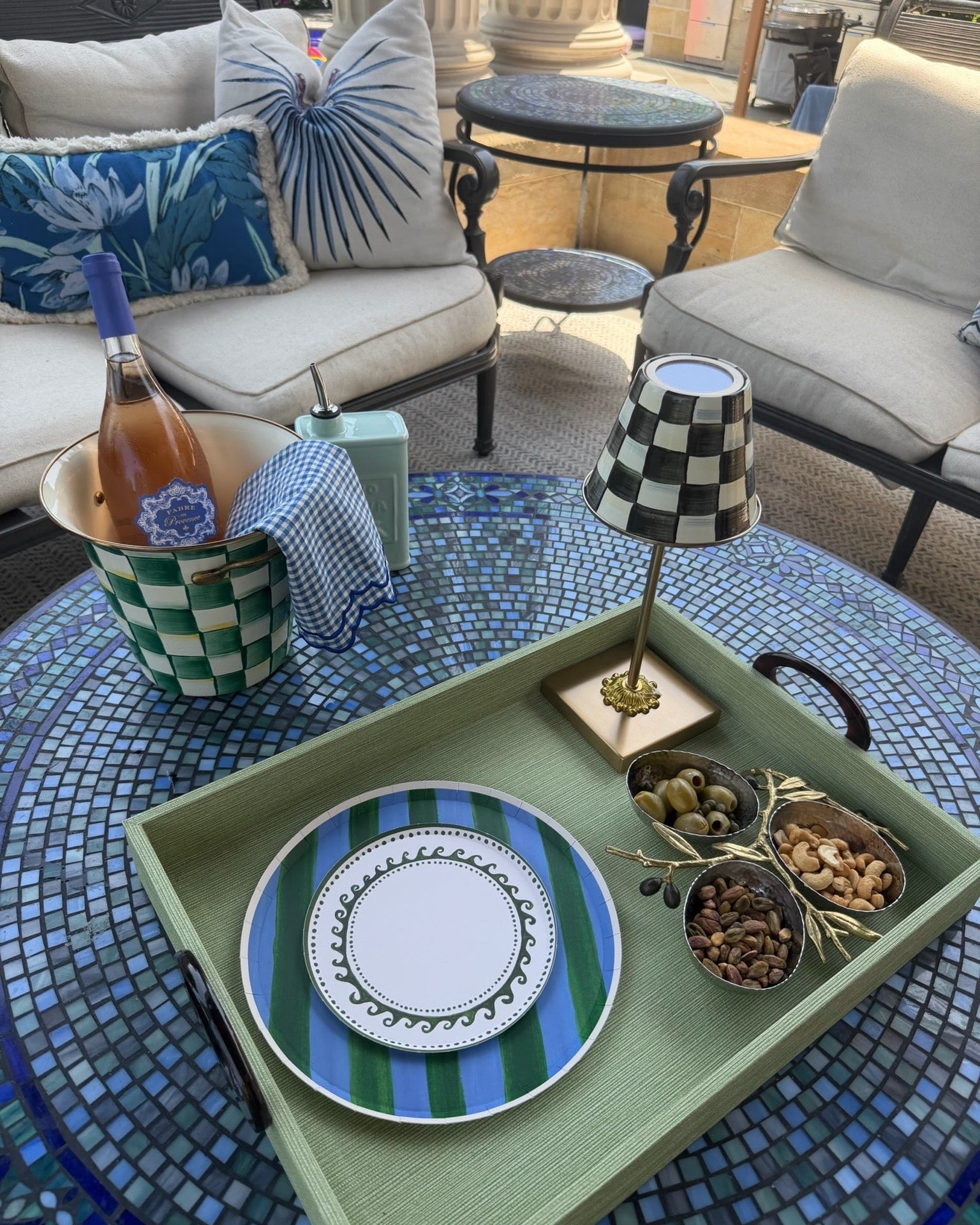 decorative plates on a snack tray in an outdoor setting