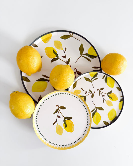 3 plates with lemons on them